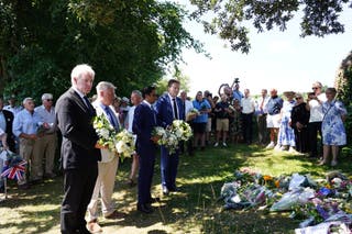 Reform UK MPs Danny Kruger and Lee Anderson, home affairs spokesperson Zia Yusuf, and deputy leader Richard Tice hold a wreath as they pay their respects near the home of Ann Widdecombe in Haytor, Dartmoor